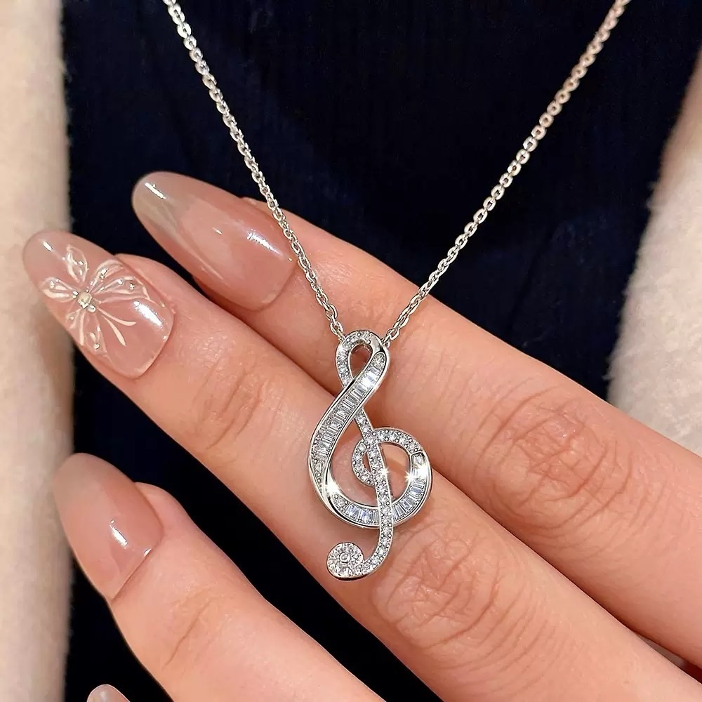 Silver Treble Clef Necklace with Clear Stones